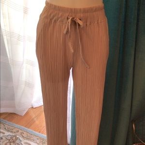 Yare by CSM fine pleats pull on pants